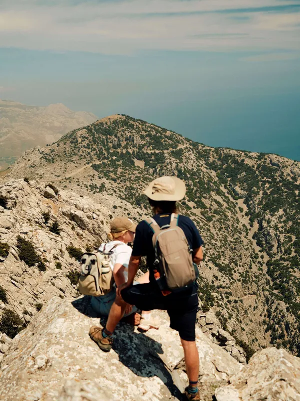 A slow cyclist guest looking out over the mountain of Psiloritis, Crete, Greece