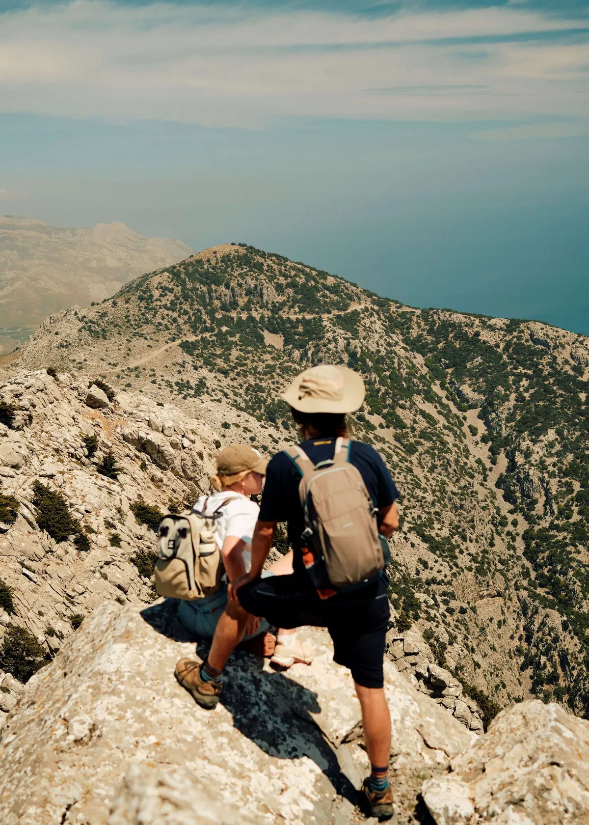 A slow cyclist guest looking out over the mountain of Psiloritis, Crete, Greece