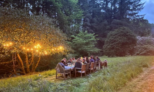 Slow Cyclist guests enjoying outdoor picnic, The Yair, Scottish Borders