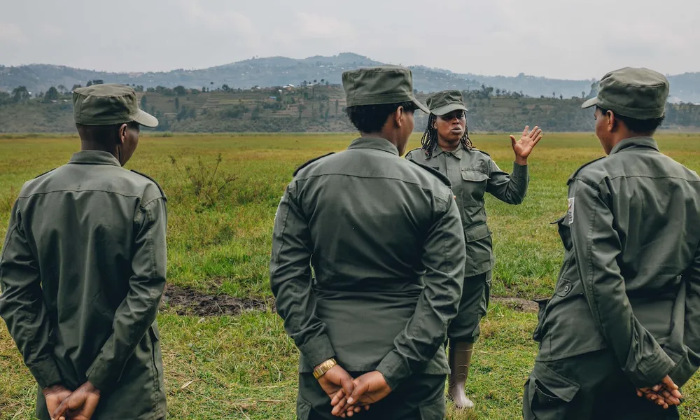 Rugezi Marsh, Ranger coordinator briefing the team before patrol, RWCA, Rwanda