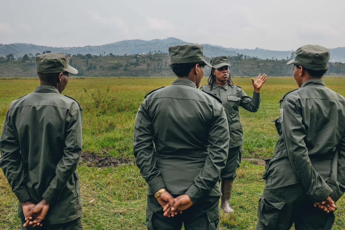 Rugezi Marsh, Ranger coordinator briefing the team before patrol, RWCA, Rwanda