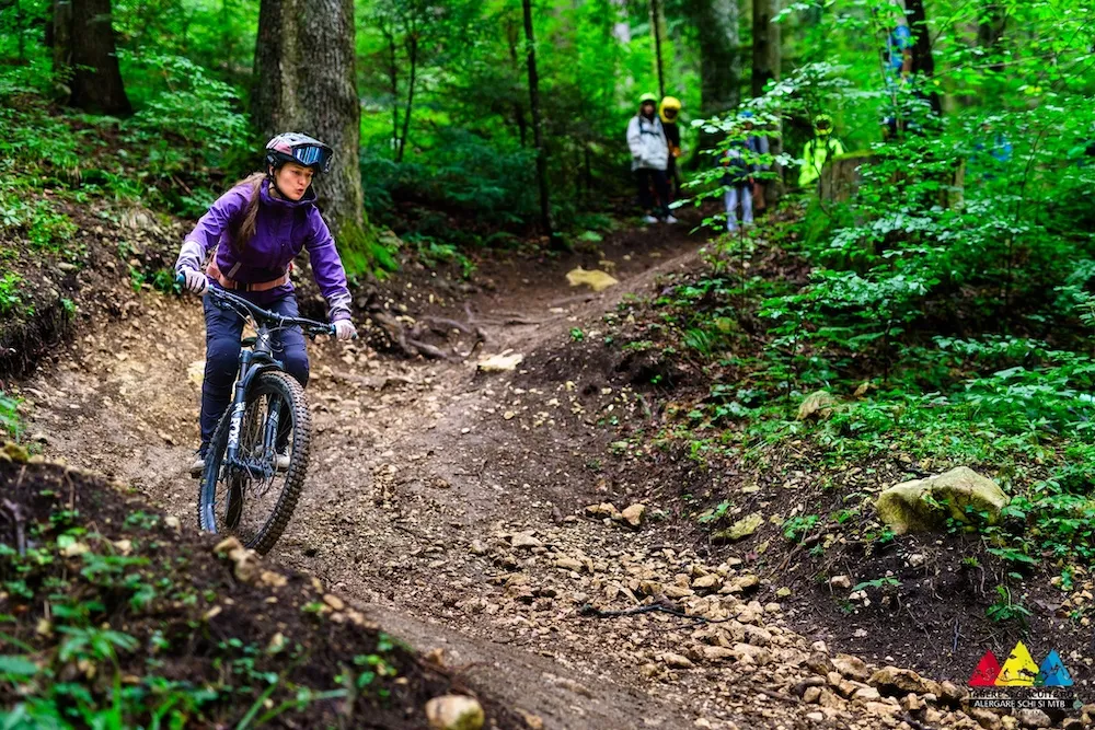 Female bike guide Teo, on trails in Romania, The slow cyclist bike guide