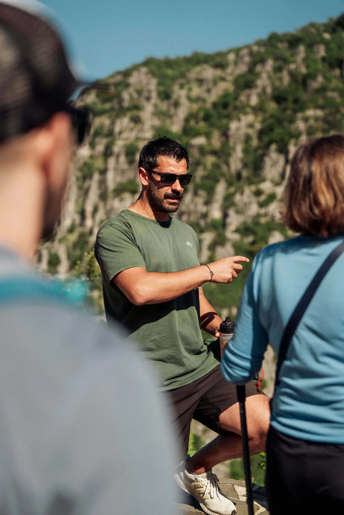 A Slow Cyclist Guide Speaking To Guests In Zagori Greece