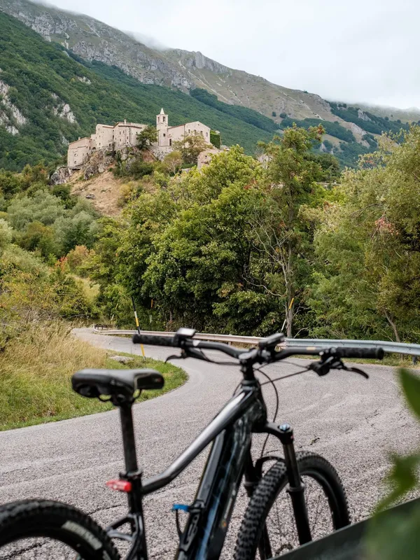 An e-bike stopped in front of the hamlet of Roccacaramanico, Abruzzo