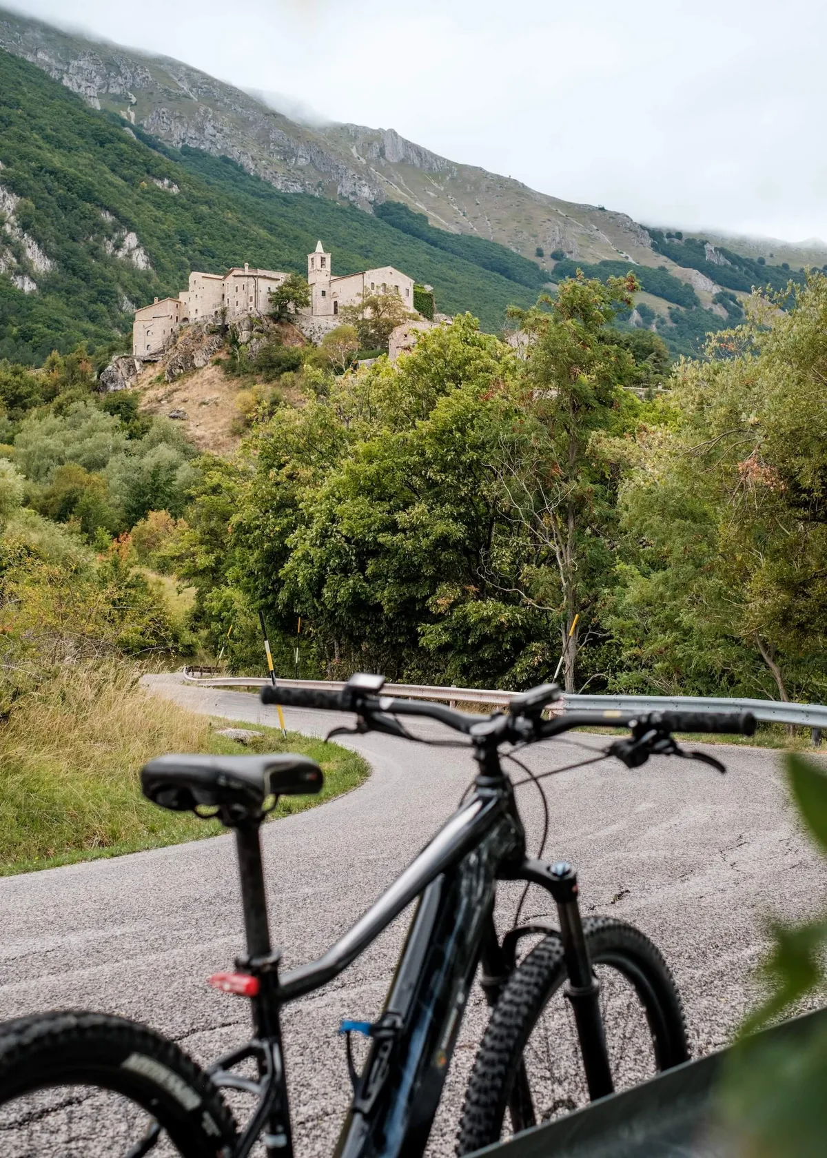 An e-bike stopped in front of the hamlet of Roccacaramanico, Abruzzo