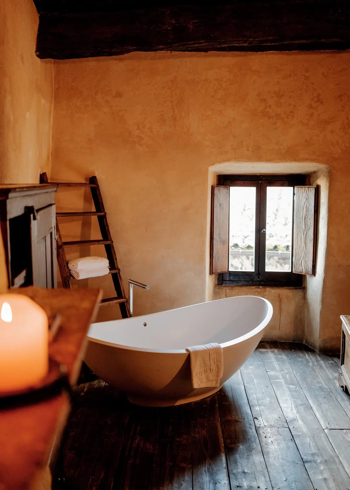 A bath in a traditional room at Sextantio Albergo Diffuso