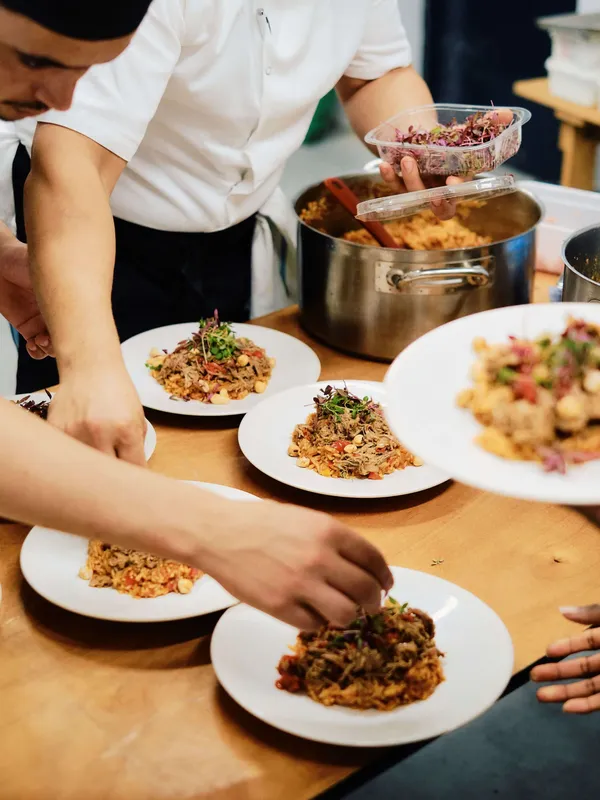 Chef's from Imad's Syrian kitchen preparing Syrian dishes for The Slow Table event