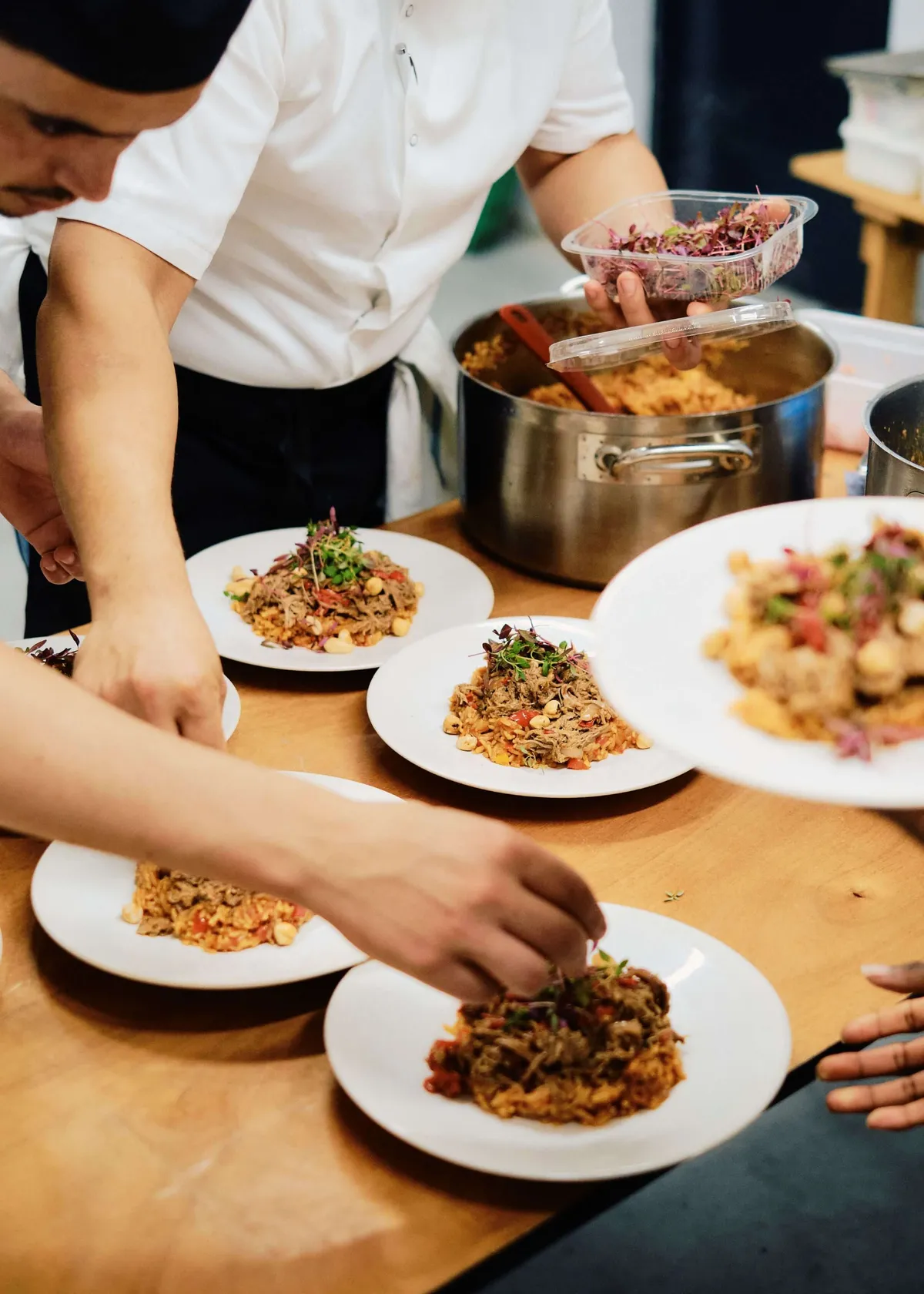 Chef's from Imad's Syrian kitchen preparing Syrian dishes for The Slow Table event