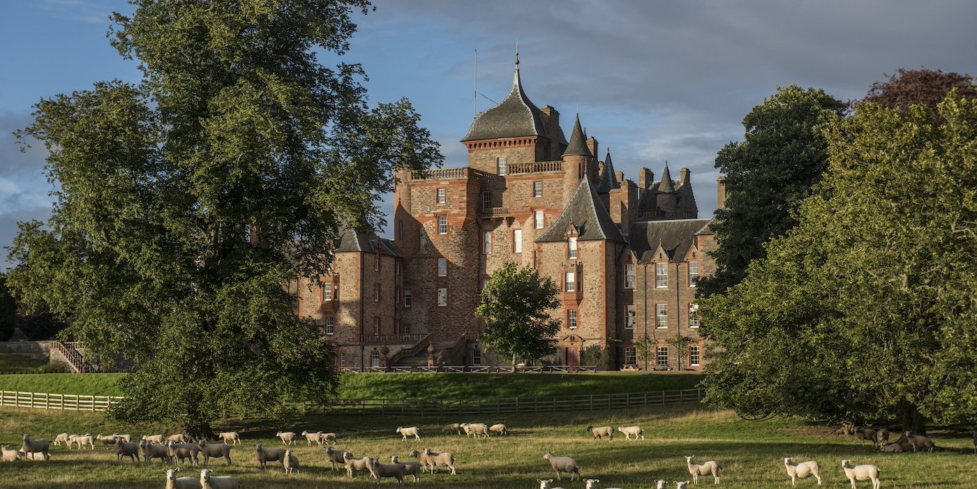 Exterior shot of Thirlestaine castle with sheep grazing, The Scottish Borders, Scotland