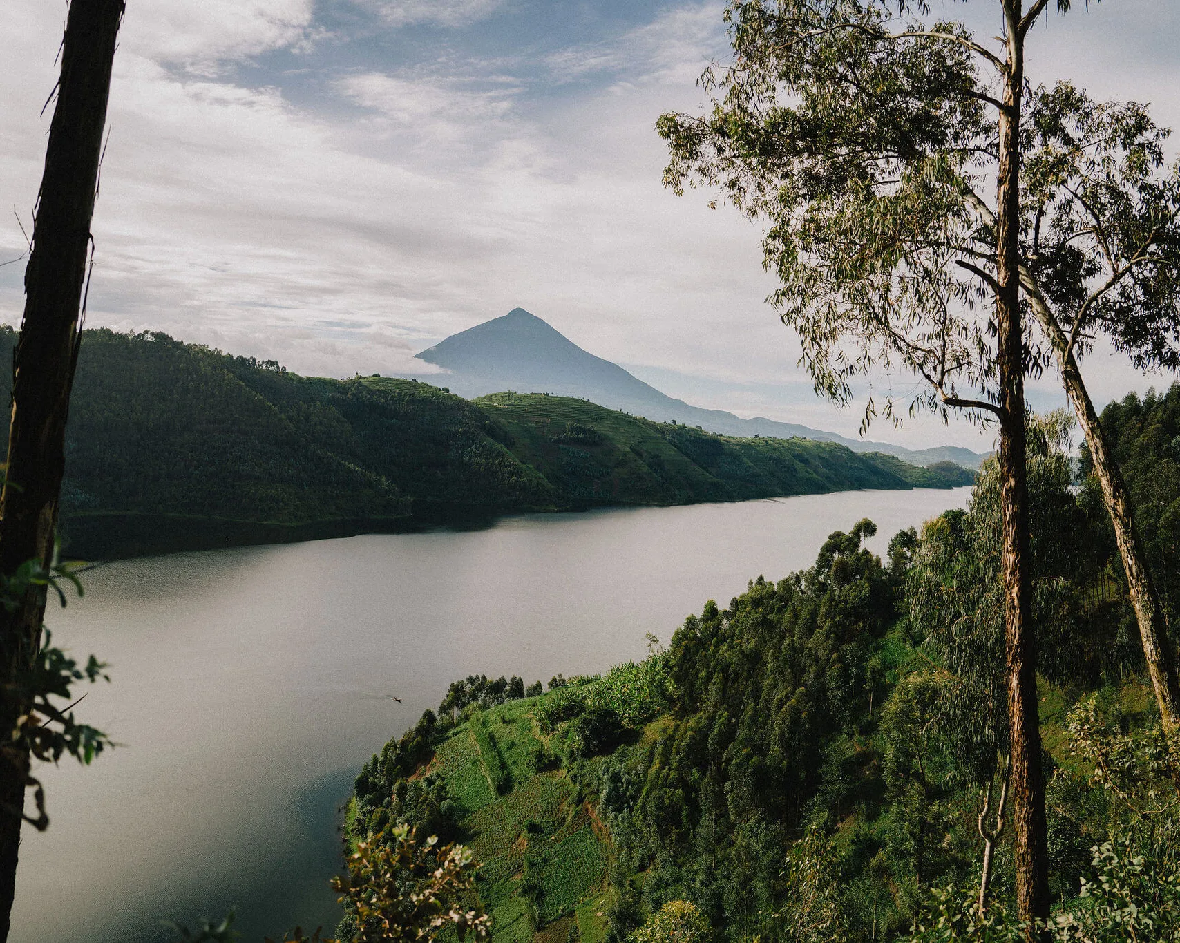 Volcano over the lake, forest and mountain, Rwanda, Africa