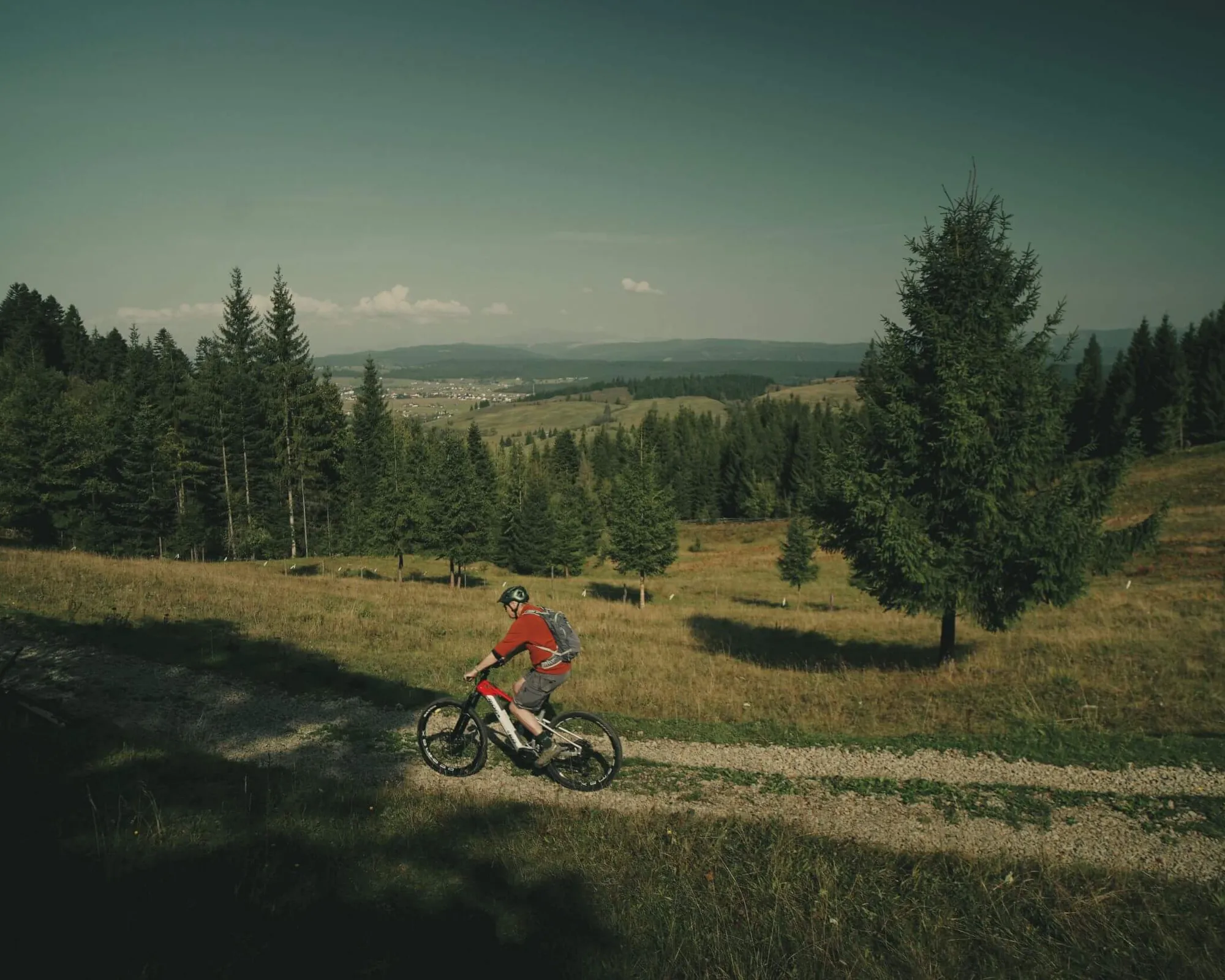 Solo cyclist on the trail, Via Transilvanica, Bucovina, Romania