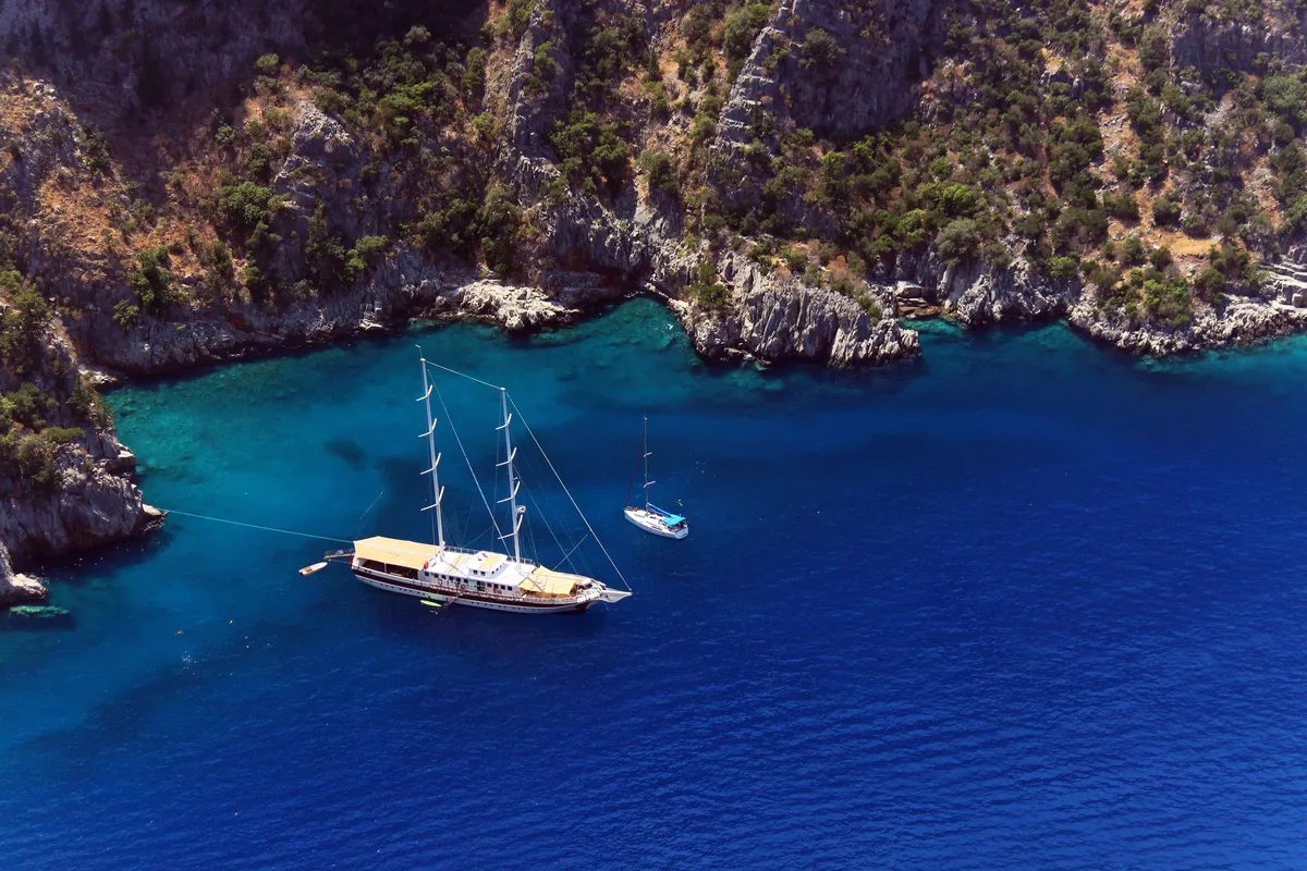 The Slow Cyclist's sailing gulet moored in a bay in the Dodecanese Islands, Greece.