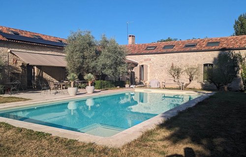 The swimming pool at Domaine de Labarthe where Slow Cyclists stay on a journey through Quercy