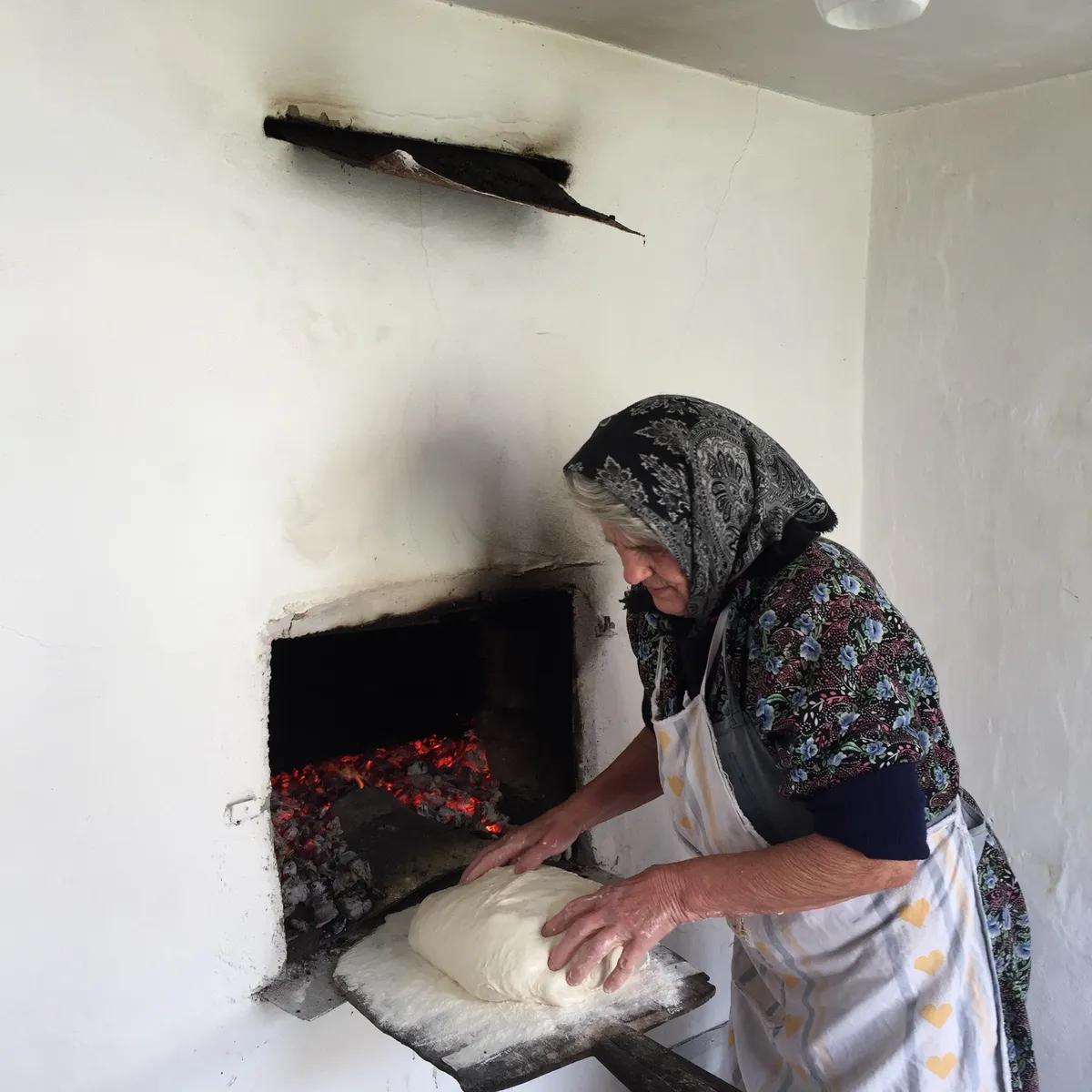 Transylvanian women cooking in traditional way, Romania