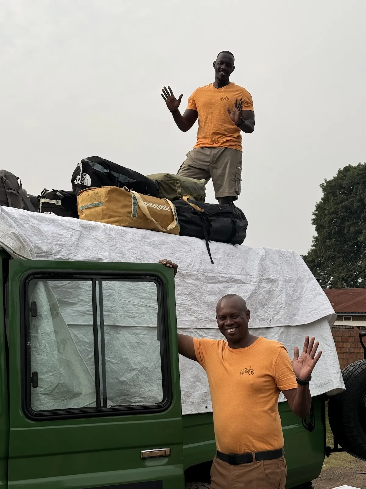 Guides and drivers by cars in Rwanda