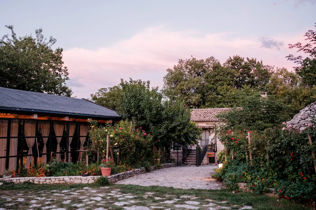 Italian home and patio, under pink sky, Case Catalano, Abruzzo, Italy