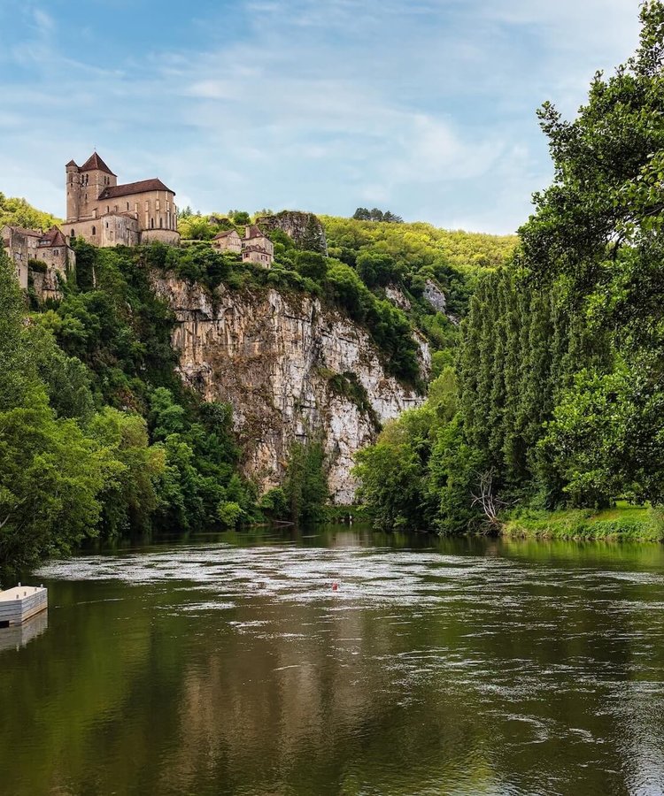The village of Saint-Cirq-Lapopie sits above the Lot River in France