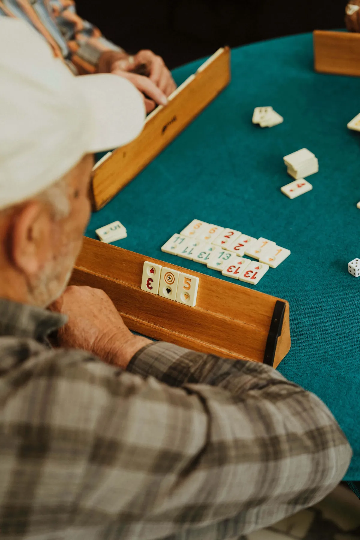 Man-playing-Okey-tile-game-in-Turkeys-Taurus-Mountains-where-Slow-Cyclists-ride