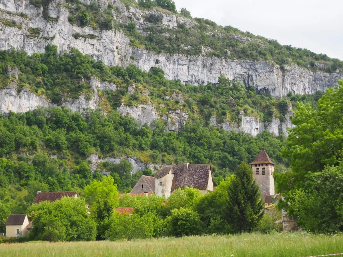 Marcilhac-sur-Célé and the limestone Causses behind in France's Quercy