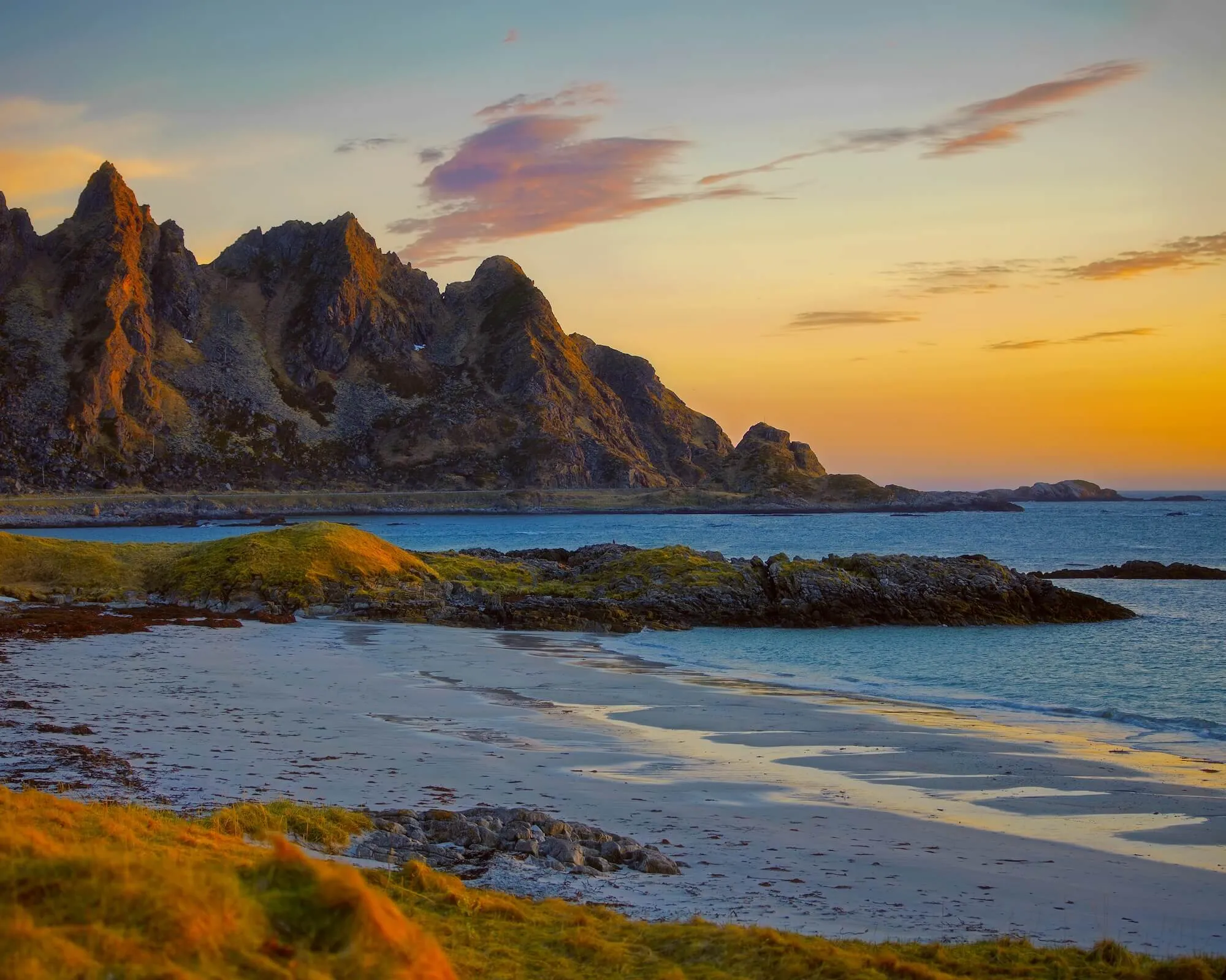 Midnight sun over beach, Vesteralen, Norway