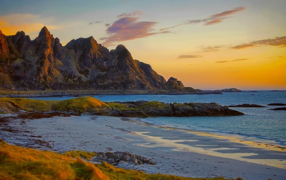 Midnight sun over beach, Vesteralen, Norway