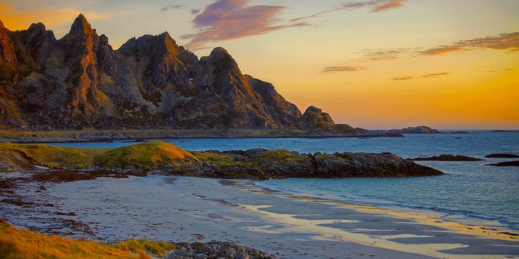 Midnight sun over beach, Vesteralen, Norway