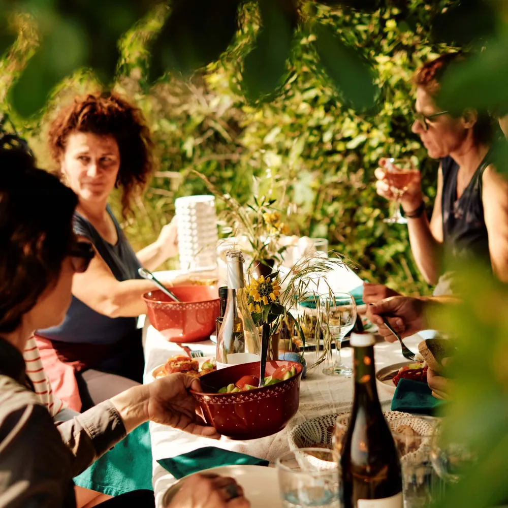 Solo travellers enjoying a picnic in Crete, Greece on a group trip with The Slow Cyclist
