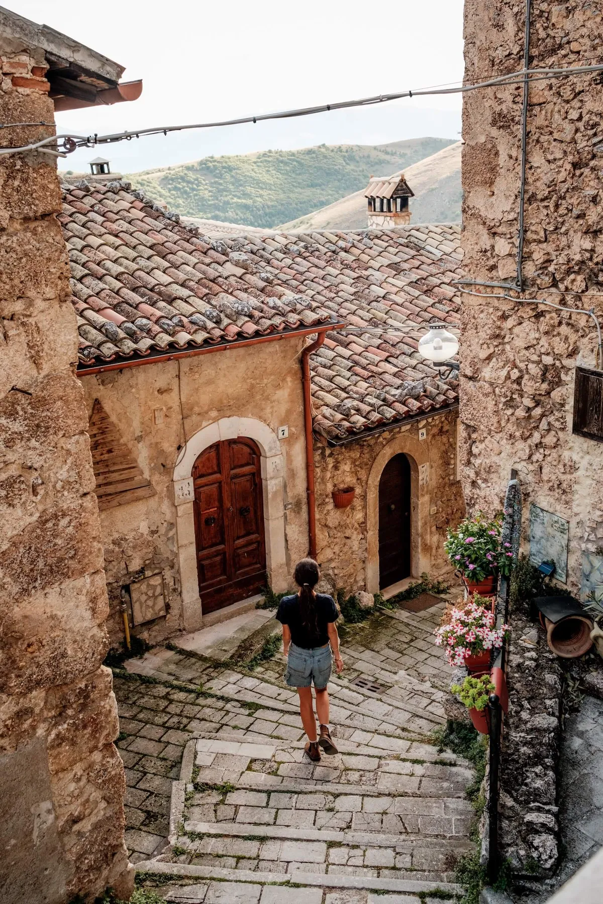 A Slow Cyclist wandering the stone cobbled streets of Santo Stefano di Sessanio