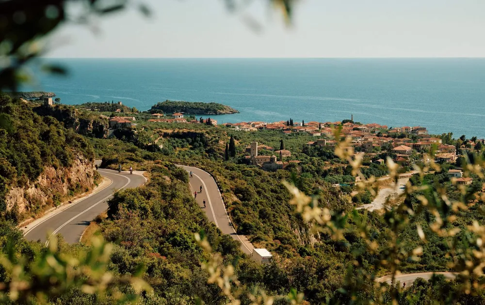 Slow-Cyclists-on-a-winding-road-in-the-Mani-Greece