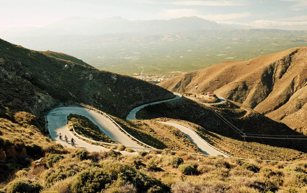 Slow-Cyclists-on-winding-roads-in-Crete-Greece