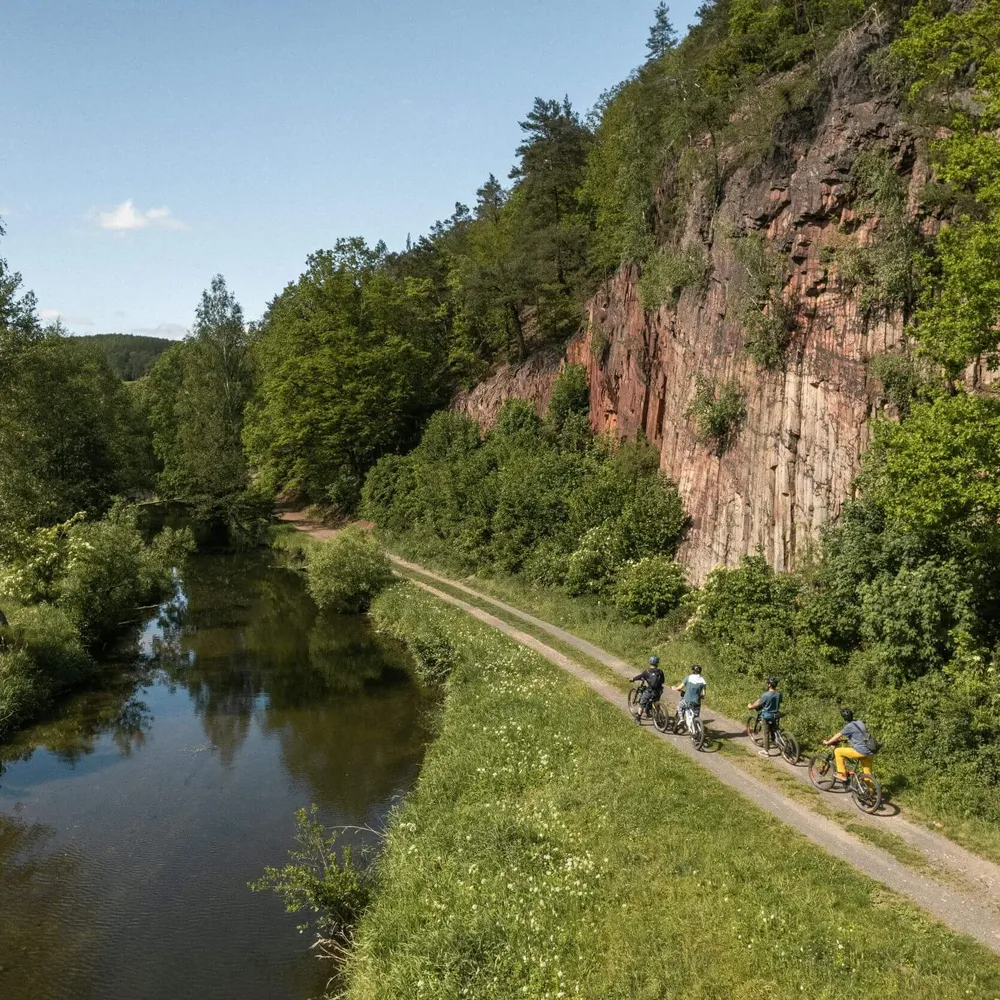 Slow-Cyclists-riding-through-a-gorge-in-Lower-Silesia-Poland