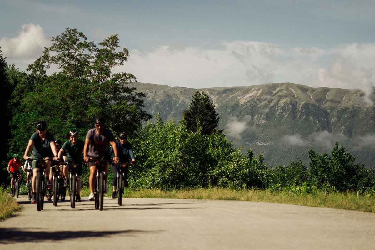 Slow-Cyclists-riding-through-the-mountains-of-Zagori-Greece