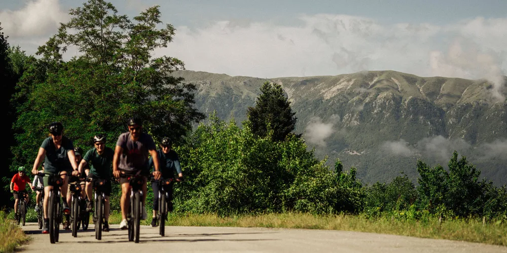 Slow Cyclists riding through the mountains of Zagori Greece