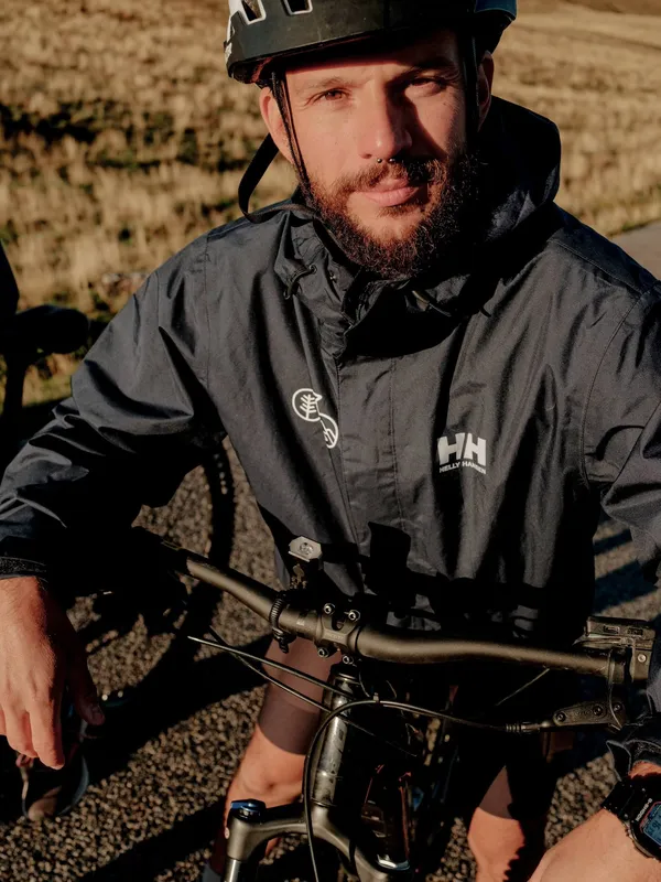 Slow Cyclist leaning on bike, campo imperatore, Abruzzo,Italy