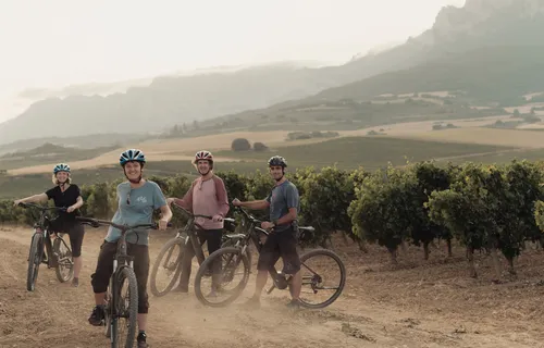 A group of four Slow Cyclist guests on their bikes in Spanish Basque Country