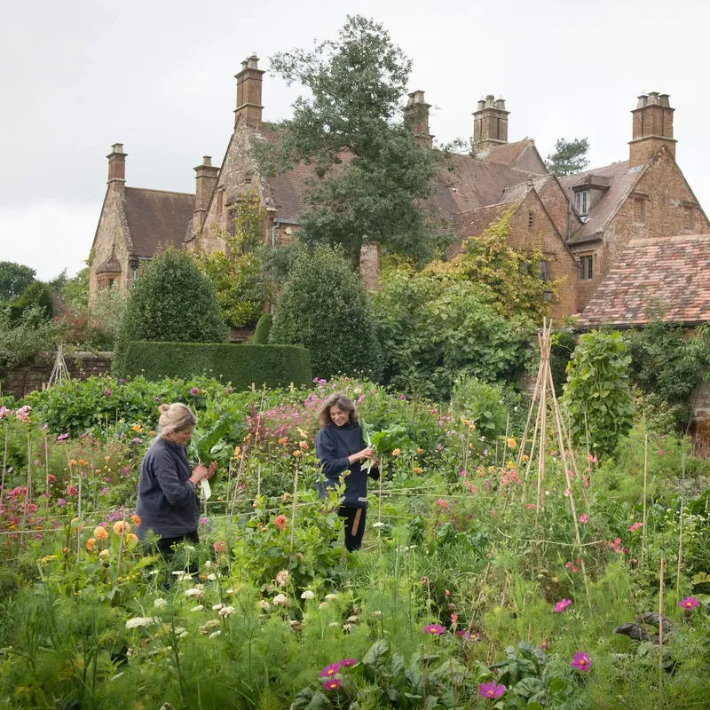 Bridget and Henrietta from The Land Gardeners tending to a country garden