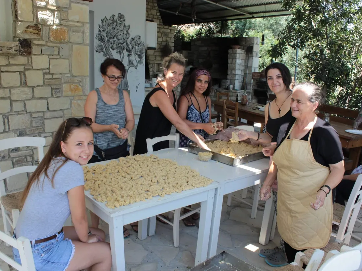 Slow Cyclists cooking traditional Cretan food